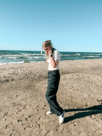 Woman on beach in Michigan