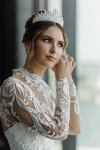 high upstyle with crown and soft glam makeup