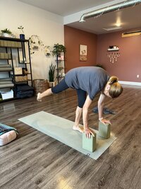 Becky practicing yoga