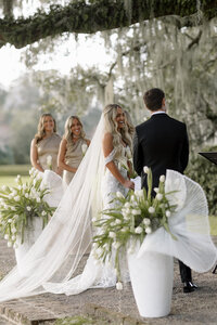 bride and groom exchanging vows