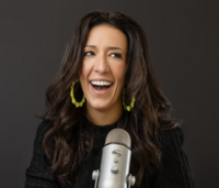 Vicki Pollack talking into microphone
