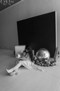Natural-light photography studio with white walls and modern furniture in Troy, MO