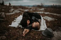 woman standing with her hand in her hair