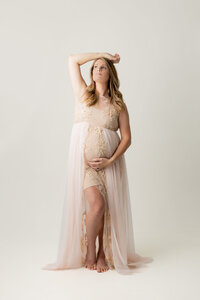 expecting mother in lace gown by mechanicsburg pa maternity photographer