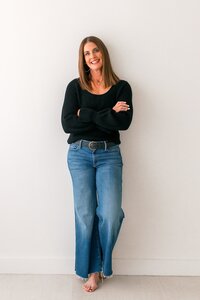 danielle muccillo of danielle muccillo photography posing for a branding session in a mesa az studio