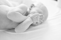 Toddler Smiling during Golden Hour by Austin Newborn Photographer