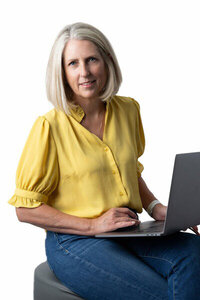 Photographer smiling for branding and website design for creatives, by Palme Design Co