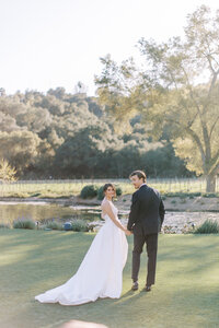Wedding photography near Houston Texas depicting a bride and groom on a golf course.