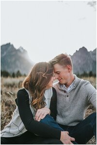 Lake Tahoe wedding photographer captures outdoor engagements with couple touching foreheads