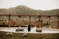 bride and groom exchanging vows