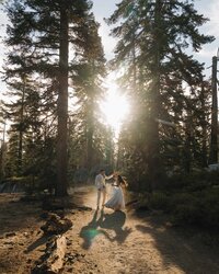 couple walking along grass edge