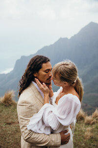 Maui Elopement Photographer captures bride and groom kissing after discussing Maui elopement packages