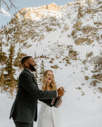 bride and groom with champagne