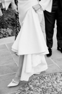 Bride and groom walk up memorial steps at their DC wedding