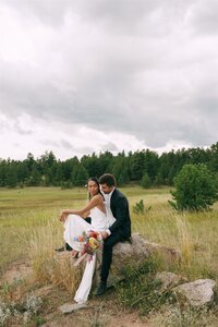 editorial style groom kicking up his feet at the Riverwood Mansion 