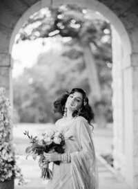 B/W Shot of a bride holding bouquet