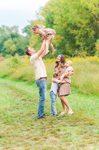 Mom and son in a field with golden grass