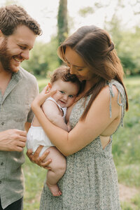 Couple embracing for engagement photos