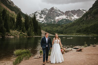 photos during wedding in mountains of colorado