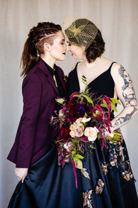 Brides leaning their forehands against each other