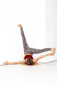Josefine in a yoga posture, showcasing balance and control in her movement.