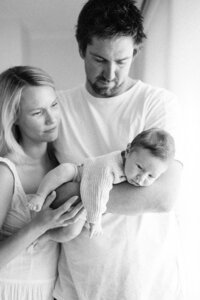 dad holding baby boy 