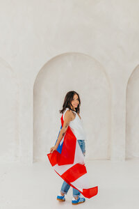 Owning her power and waving the Puerto Rican flag like an anthem- this is what investing in bold design looks like.