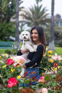 Pet and owner smiling at Palisades Park in Santa Monica