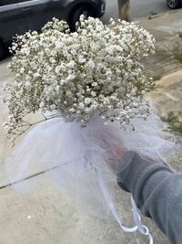 Simple baby's breath bouquet tied with white tulle