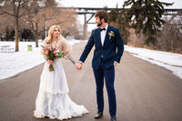 Bride and groom looking at each other in wedding photo