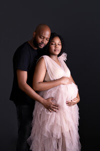 silhouette of mommy holding tummy