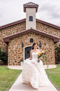 Bride walks out of the chapel at Ma Maison, one of Austin’s best wedding venues.