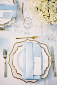 Wedding place setting with custom menu and placecard design