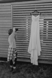 bride stands in opening
