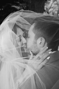 black & white couple on their wedding day under the veil flash photography photojournalism winter wedding