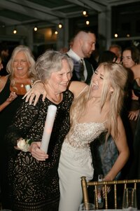 bride hugging her mom