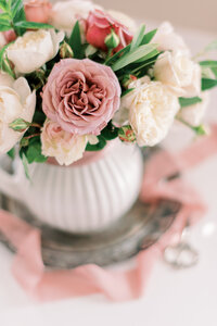 Garden roses with ribbon and antique styling tray