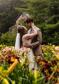 Intimate Garden Wedding. Couple in the garden, surrounded by flowers.