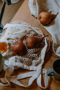 Pears sitting on a reusable bag