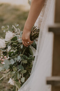 Timeless wedding bouquet in a backyard elopement