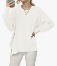woman modeling white sweater