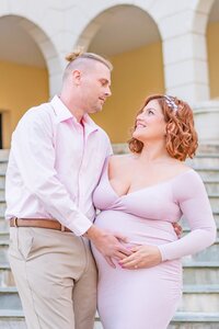 expecting couple looking at each other during Warrenton, VA maternity photos
