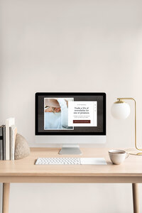 Aubre holding color swatches and smiling