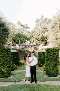 couple standing in beautiful garden