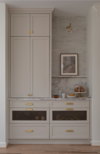 Project image of off-white cabinetry near breakfast nook, by Alexa at Home