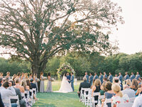 Outdoor wedding ceremony at The French Farmhouse in Dallas