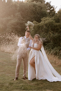 relaxed wedding photography copdock hall editorial legs flowers