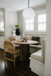 Light, bright breakfast nook, designed by Hope Miriam Designs in DFW