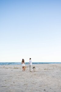 couple walking on north topsail beach, north carolina