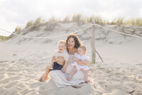 Bride standing under a red neon sign